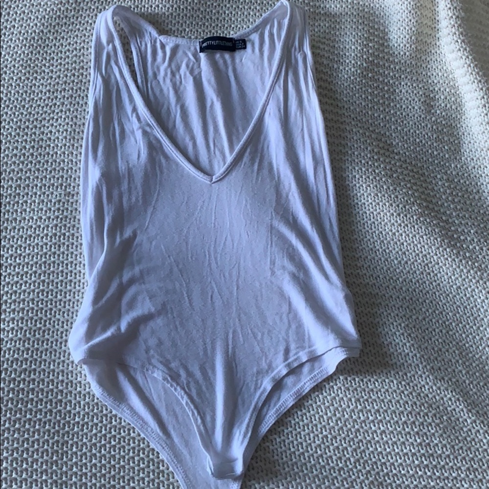 White plunge body suit